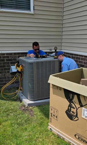 Two of the awesome R&L Heating and Cooling employees who might help with your Furnace service near Groose Pointe
