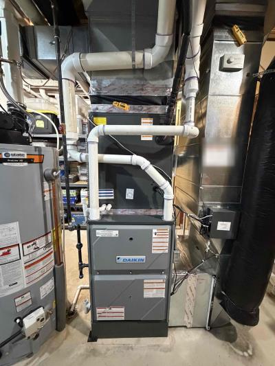 New Daikin gas furnace installed in a basement near Dexter, Michigan
